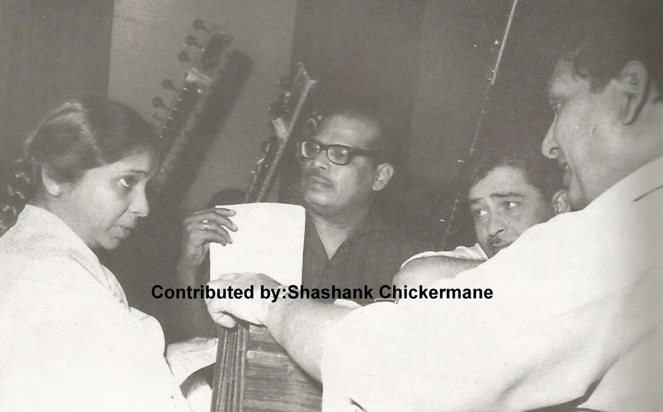 Asha Bhosale with Mannadey rehearsals a song with Shankar & Raj Kapoor in the recording studio