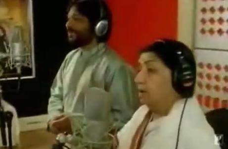 Lata with Roop Kumar Rathod recording a song in the recording studio