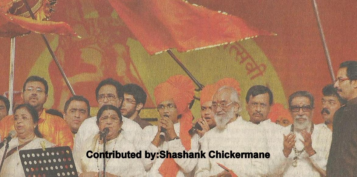 Lata, Usha Mangeshkar, Hridyanath Mangeshkar & Chorus singing in a concert