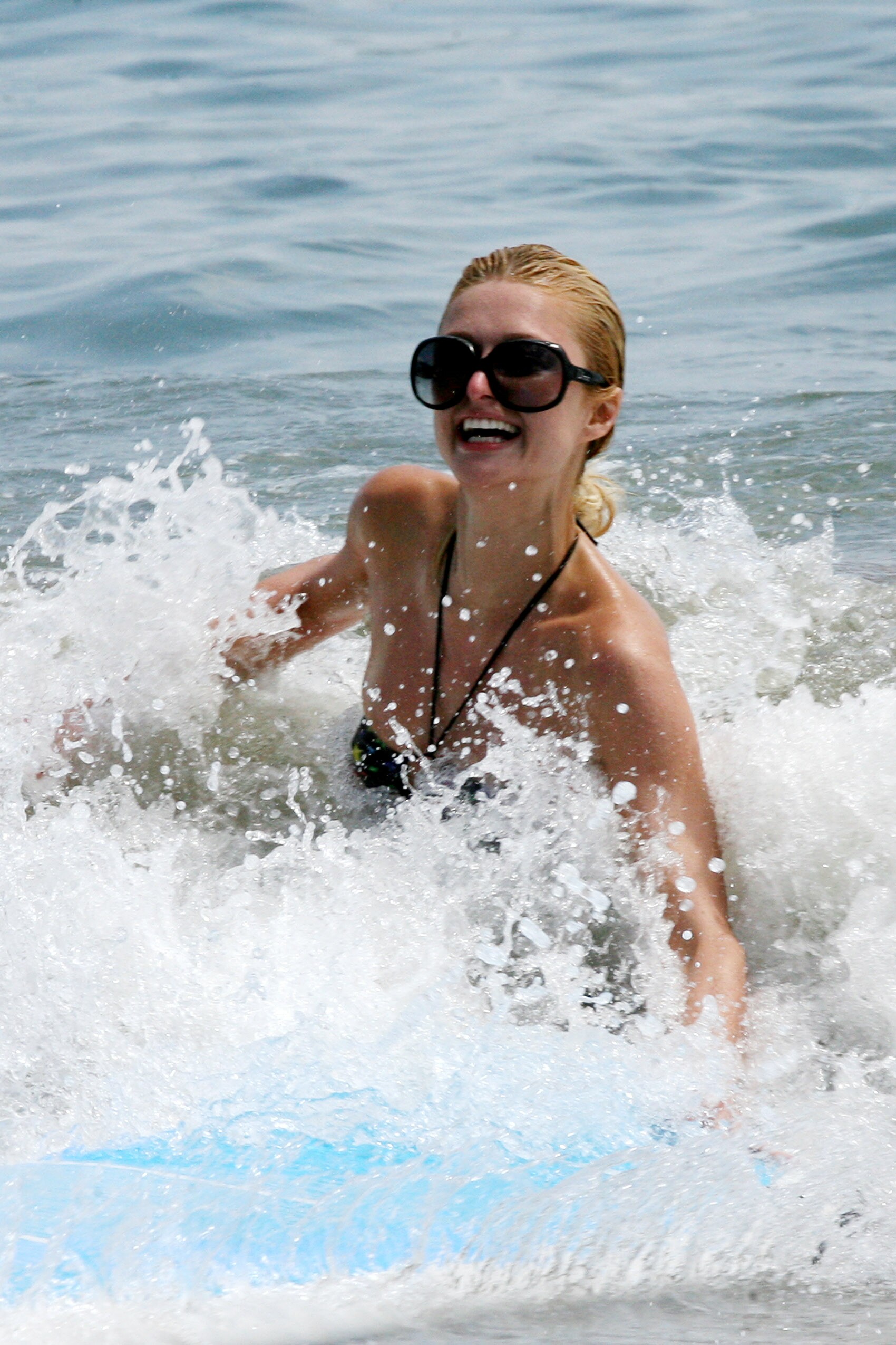 Paris Hilton - bikini candids in Malibu Beach-4