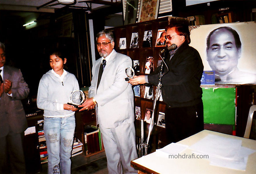 P9 - Painting Competition prize distribution at Bhartiya Vidya Bhavan  Mr.Naresh Sharma and Triloknath from the Rafi Foundation