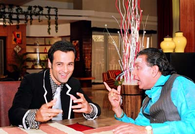 Rohit Roy and Mithun Chakraborty in a still from the movie Don Muthuswami