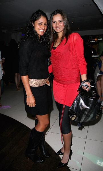 Tennis player Sania Mirza (R) with a guest pose inside the Sony Ericsson WTA Tour pre-Wimbledon Player Party at Kensington Roof Gardens June 19, 2008 in London, England