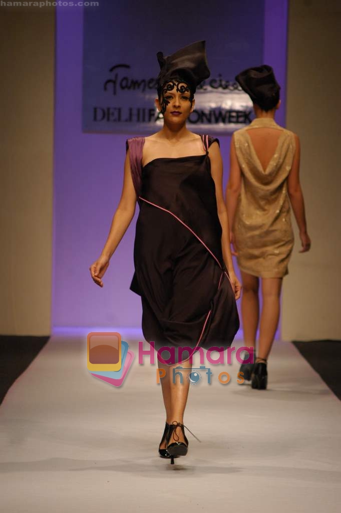 Model walk the ramp for James Ferreira at Delhi Fashion Week on 3rd December 2008 