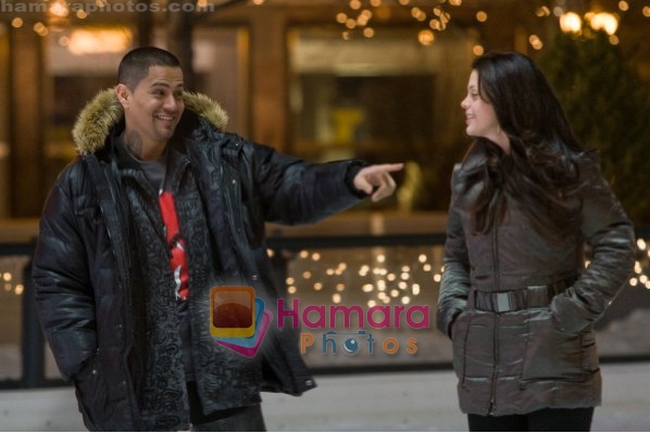 Melonie Diaz, Jay Hernandez in still from the movie Nothing Like the Holidays