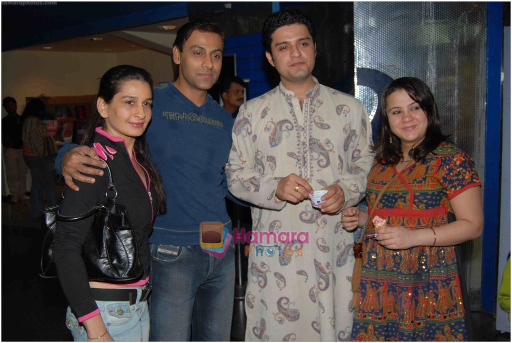 Anupam Bhattacharya with wife and Harsh Vasishta with wife Ritu at Marley and Me screening on 5th Feb 2009