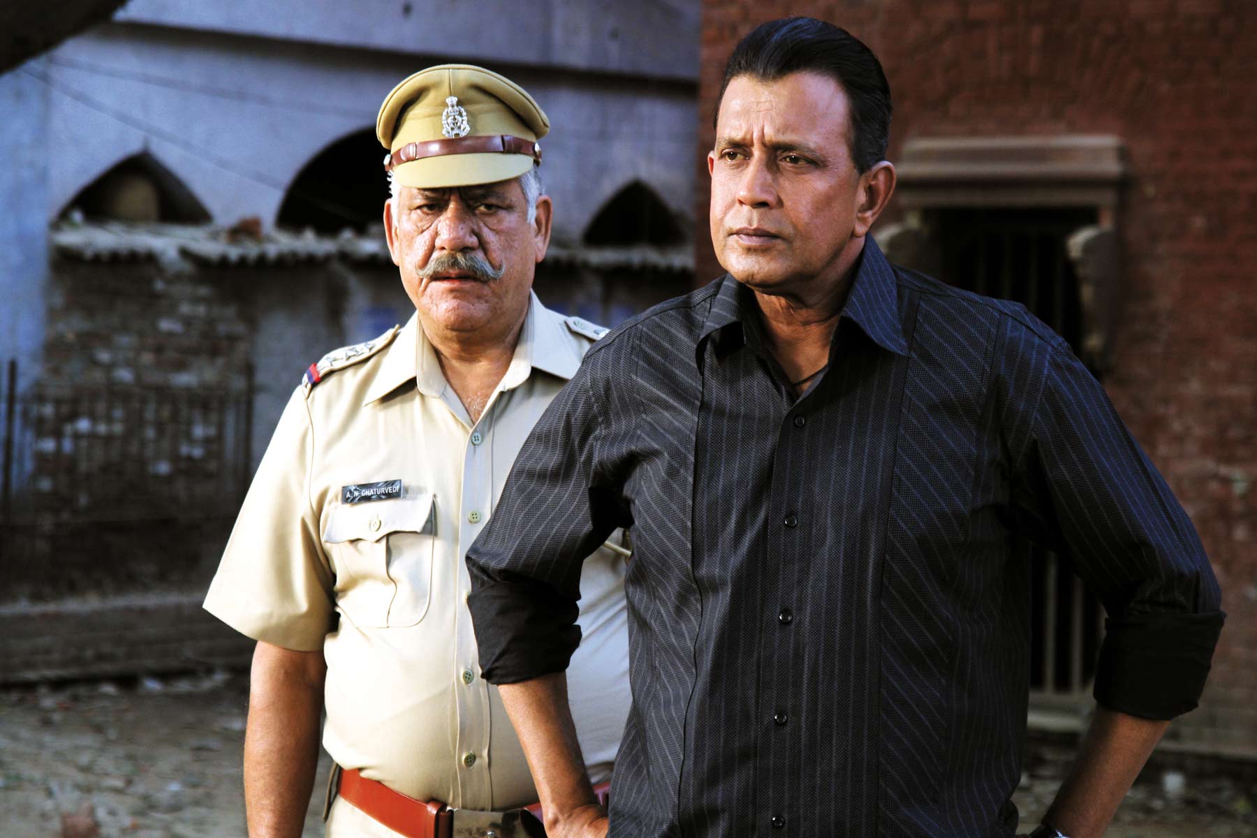 om puri and mithun chakrobarty in the still from movie Baabarr