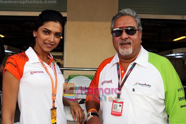 Dr. Vijay Mallya (IND) Force India F1 Team Owner and Deepika Padukone (IND) at Force India F1. Formula One World Championship, Abu Dhabi Grand Prix, Yas Marina Circuit, Abu Dhabi