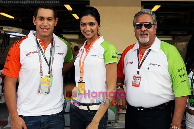 Dr. Vijay Mallya (IND) Force India F1 Team Owner and Deepika Padukone (IND) and Ross Taylor  at Force India F1. Formula One World Championship, Abu Dhabi Grand Prix, Yas Marina Circuit, Abu Dhabi