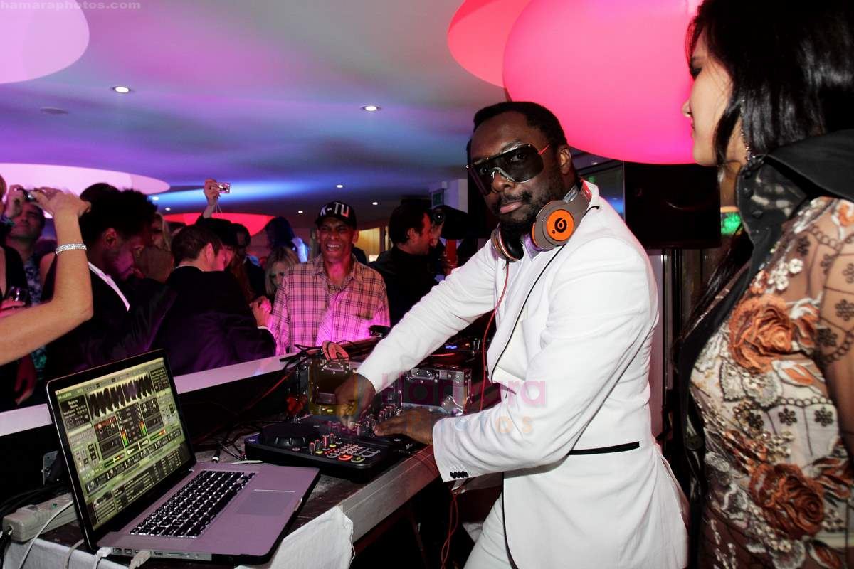 Will I am performs at the de Grisogono CRAZY CHIC EVENING cocktail party at the Hotel Du Cap Eden Roc on May 18, 2010 in Antibes, France