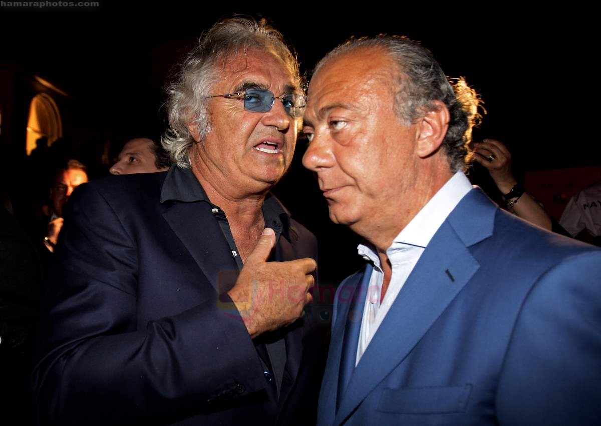 Flavio Briatore and Fawaz Gruosi attend the de Grisogono CRAZY CHIC EVENING cocktail party at the Hotel Du Cap Eden Roc on May 18, 2010 in Antibes, France
