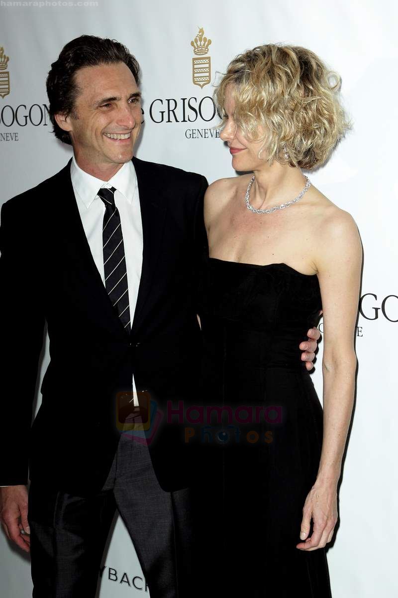 Lawrence Bender and Meg Ryan attend the de Grisogono party at the Hotel Du Cap on May 18, 2010 in Cap D_Antibes, France 