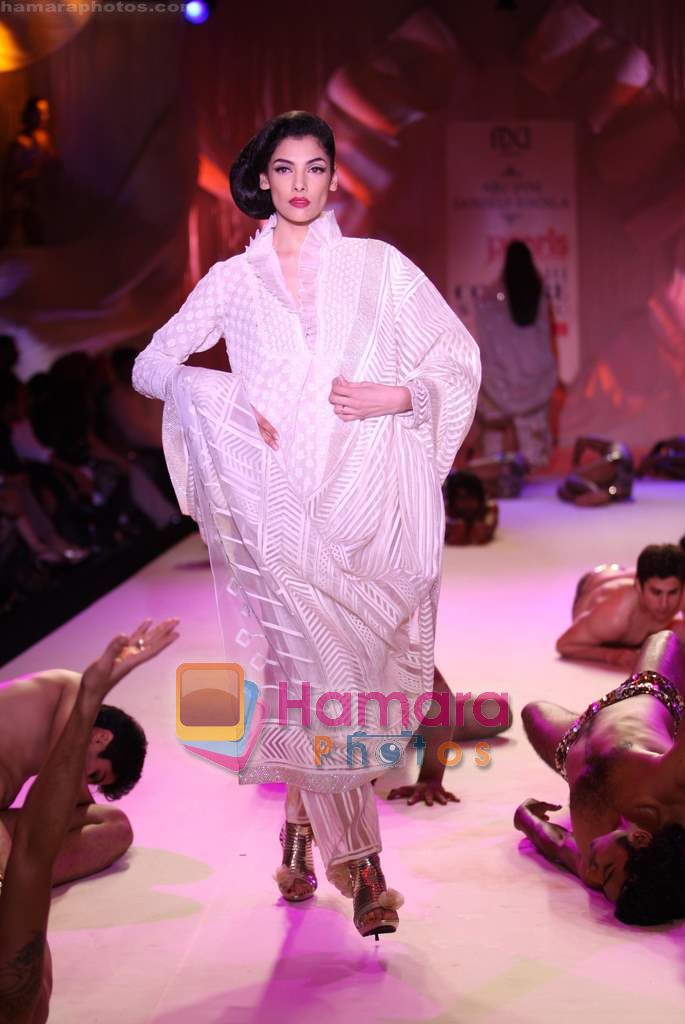 Model walk the ramp for Abu Jani Show at Pearls Delhi couture week on 25th July 2010 