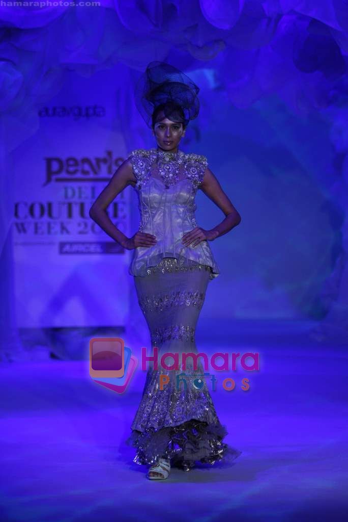 Model walk the ramp for Gaurav Gupta Show at Pearls Delhi couture week on 25th July 2010