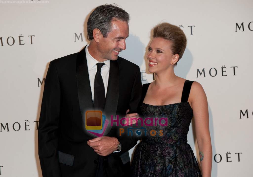 Scarlett Johansson and Moet CEO and President at Moet Chandon event 