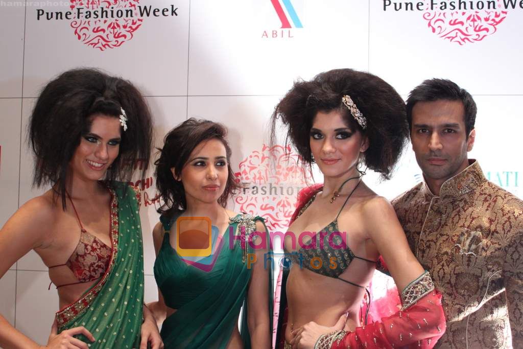 Model walk the ramp for Mandira Wirk Show at The ABIL Pune Fashion Week Day 1 on 18th Nov 2010 