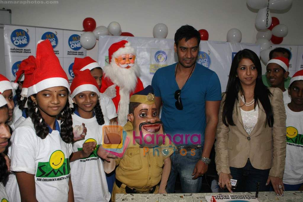 Ajay Devgan celeberates christmas with children in Mid Day Office on 22nd Dec 2010 