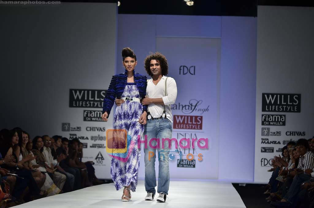 Model walks the ramp for Rahul Singh show on Wills Lifestyle India Fashion Week 2011 - Day 2 in Delhi on 7th April 2011