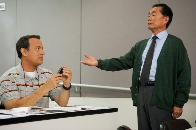 Tom Hanks, George Takei in still from the movie Larry Crowne