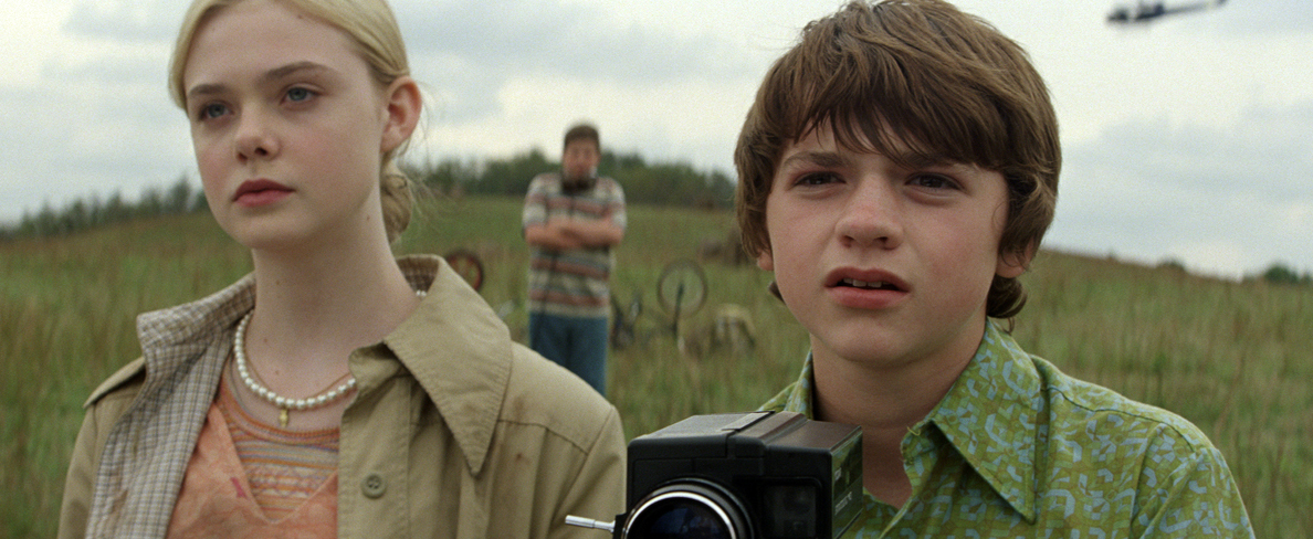 Elle Fanning, Joel Courtney in the still from the movie Super 8 Eight