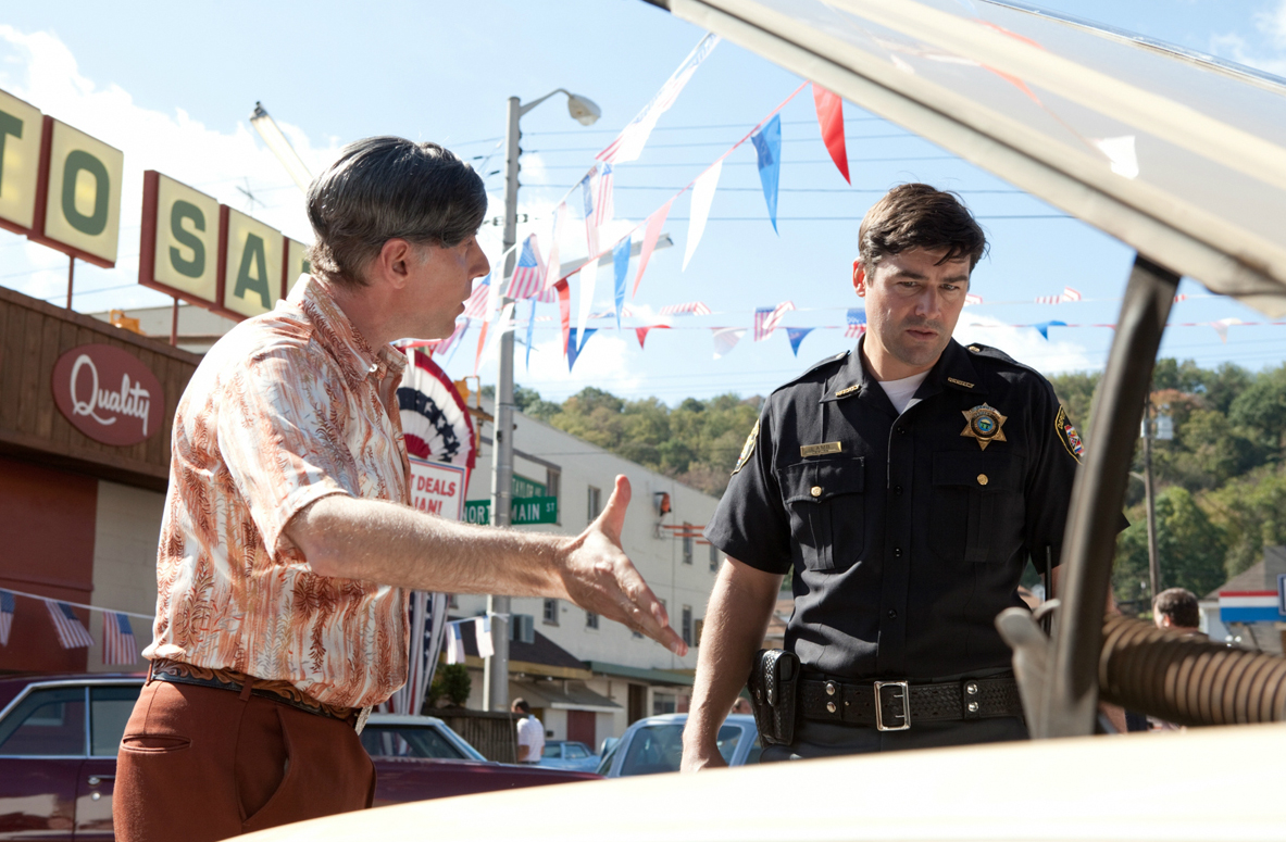 Dan Castellaneta, Kyle Chandler in the still from the movie Super 8 Eight