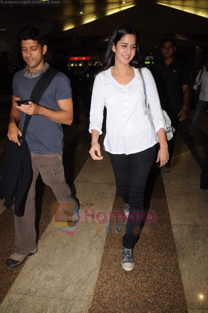 Farhan Akhtar, Katrina Kaif as they return fom Zindagi Na Milegi Dobara road tour in Airport, Mumbai on 12th July 2011