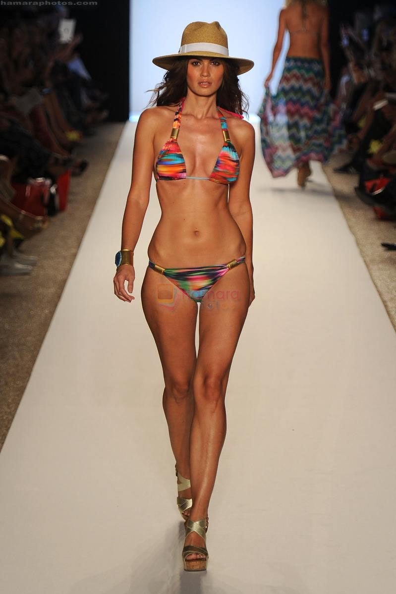 A model walks the runway during LSPACE BY MONICA WISE show at Mercedes-Benz Fashion Week Swim shows at The Raleigh on July 15, 2011 in Miami Beach, Florida