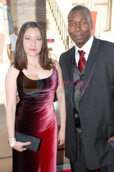 Johnny Kirk, Jacky Tirado at the 15th Annual Los Angeles Latino International Film Festival - Arrivals in The Egyptian Theatre, Hollywood, CA, USA on 17th July 2011