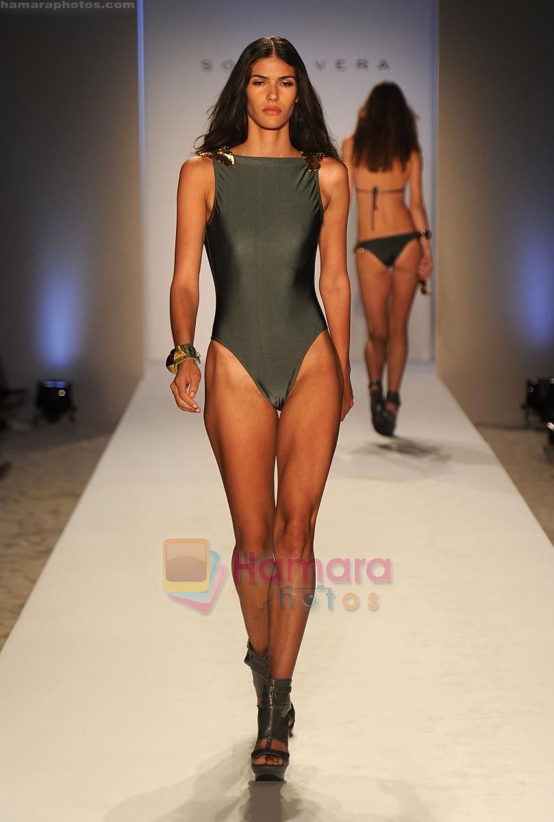 A model walks the runway at the Sonia Vera Swimwear show during Merecedes-Benz Fashion Week Swim 2012 on July 18, 2011 in Miami Beach, United States