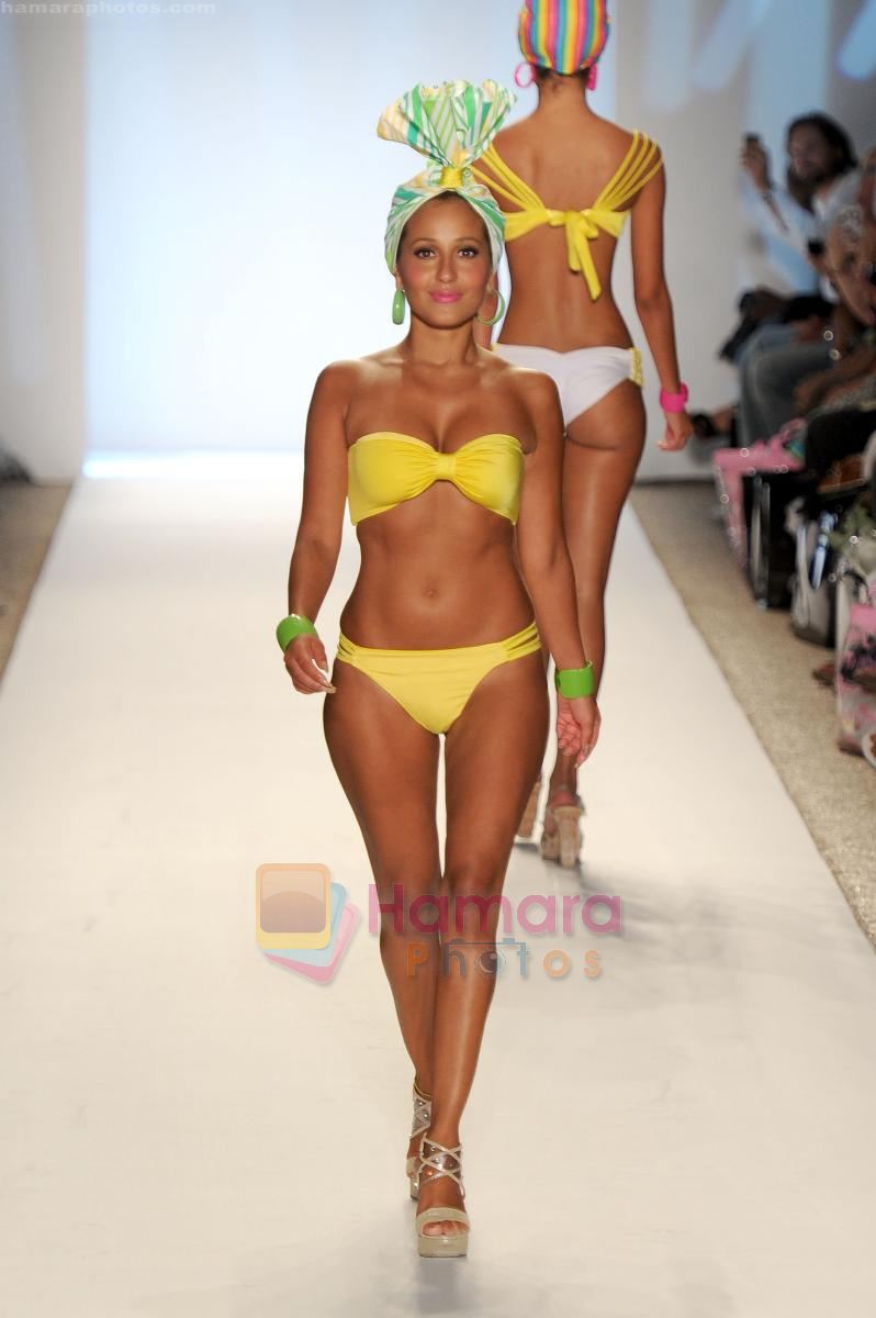 A model walks the runway at the Nicolita show during Merecedes-Benz Fashion Week Swim 2012 on July 18, 2011 in Miami Beach, United States