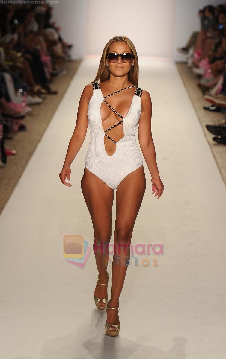 A model walks the runway at the A.Z Araujo show during Merecedes-Benz Fashion Week Swim 2012 on July 18, 2011 in Miami Beach, United States