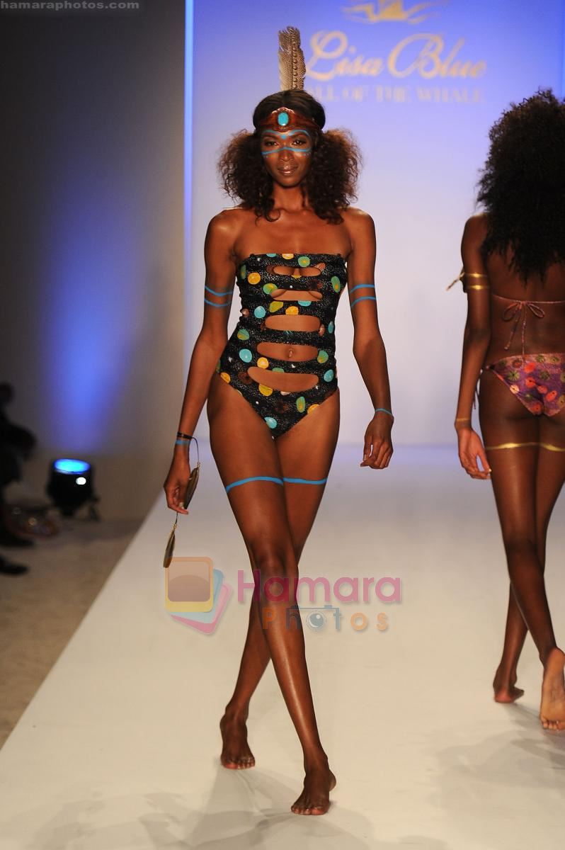 A model walks the runway at the Lisa Blue show at Mercedes-Benz Fashion Week Swim 2012 at The Raleigh on July 17, 2011 in Miami Beach, Florida