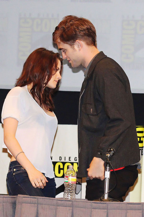Robert Pattinson, Kristen Stewart poses to promote Breaking Dawn from the Twilight Saga at  the 2011 Comic-Con International Day 1 at the San Diego Convention Center on July 21, 2011