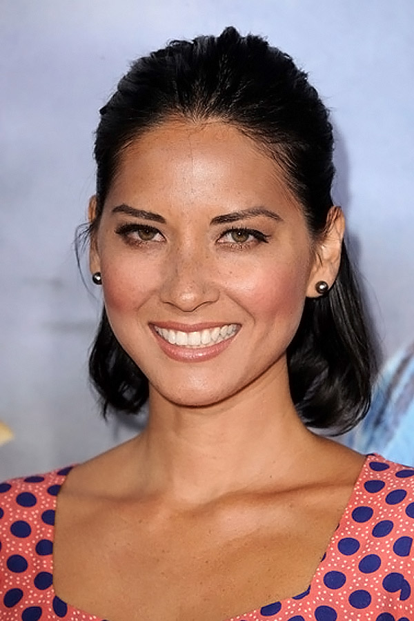Olivia Munn arrives at the world premiere of the movie Cowboys and Aliens at San Diego Civic Theatre on July 23, 2011 in San Diego, California