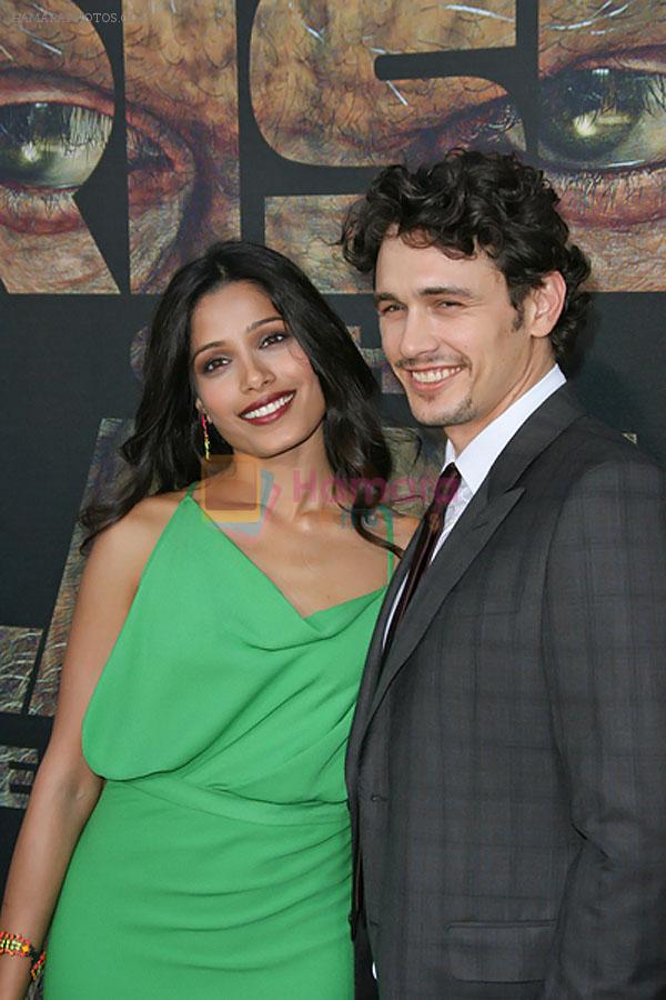 Freida Pinto and James Franco attends the LA Premiere of the movie Rise Of The Planet Of The Apes on 28th July 2011 at the Grauman's Chinese Theatre in Hollywood, CA  United States