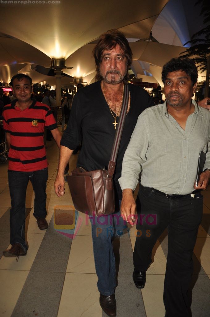 Shakti Kapoor, Johnny Lever snapped at Airport in Mumbai on 3rd Aug 2011