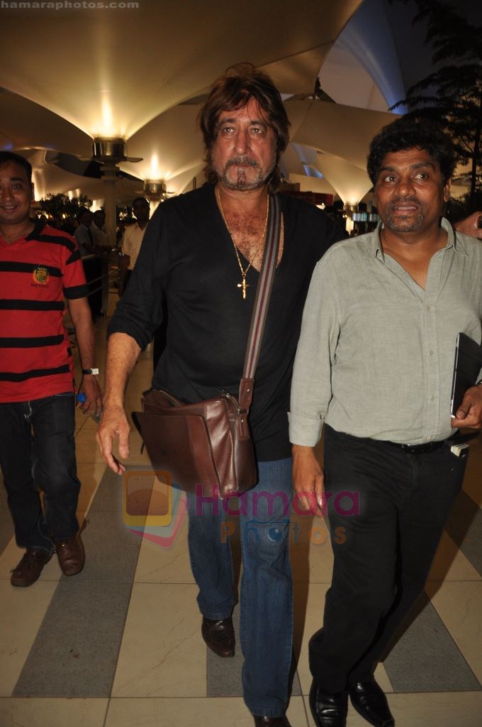 Shakti Kapoor, Johnny Lever snapped at Airport in Mumbai on 3rd Aug 2011
