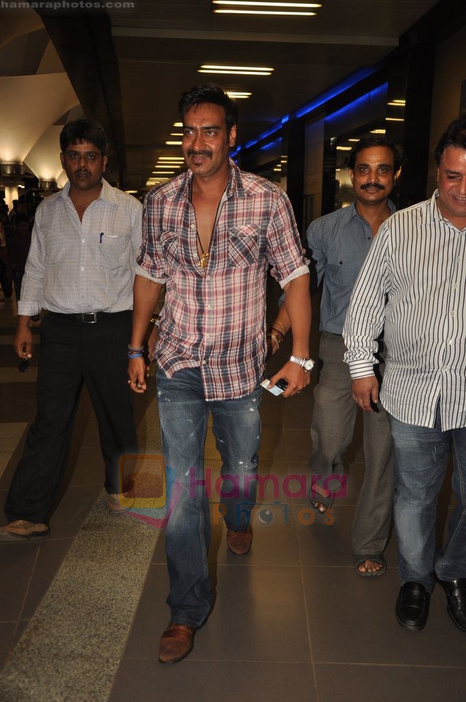 Ajay Devgan snapped at Airport in Mumbai on 3rd Aug 2011