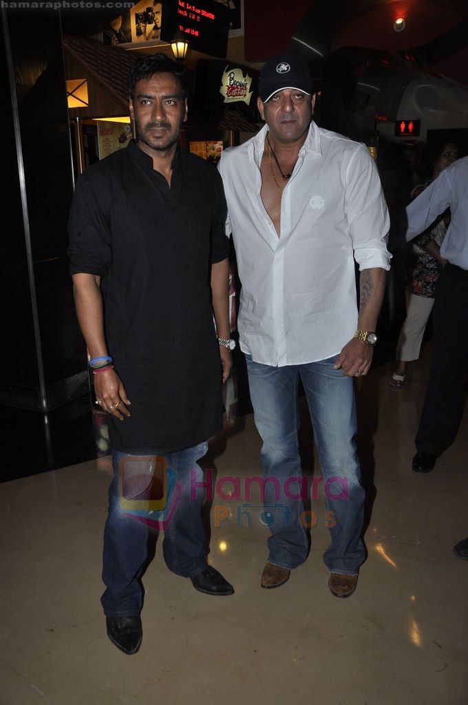 Ajay Devgan, Sanjay Dutt at the launch of Rascals first look in PVR, Juhu, Mumbai on 12th Aug 2011