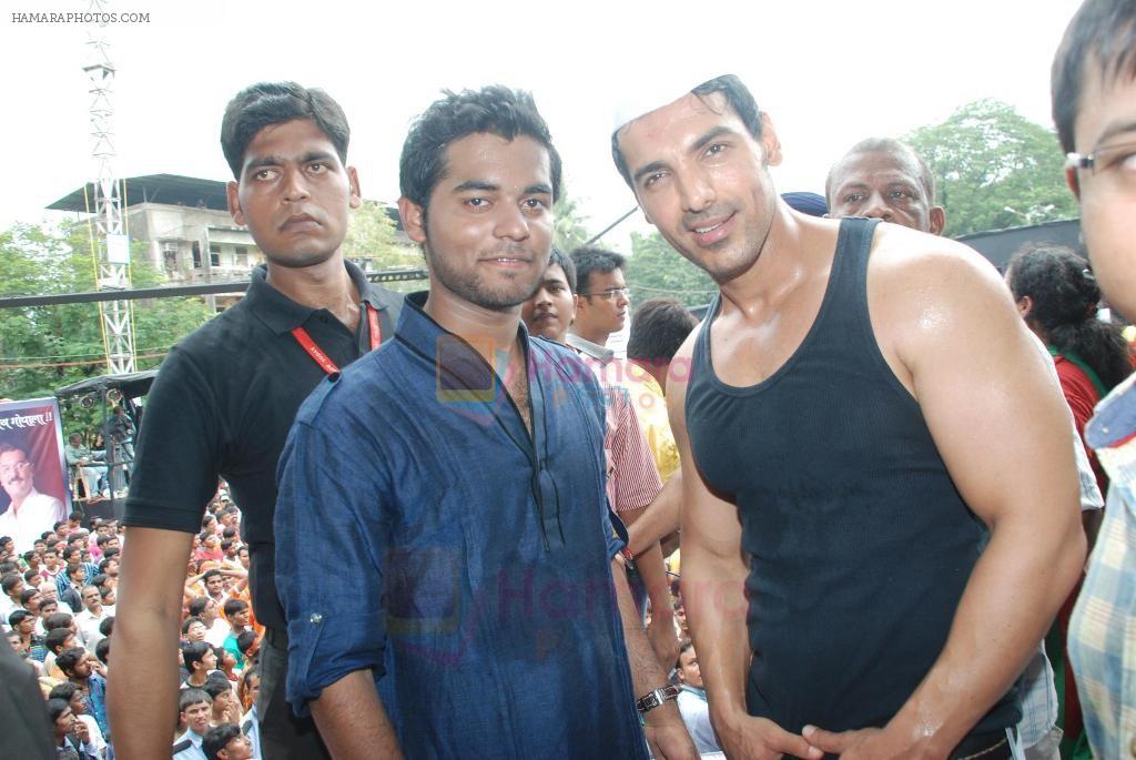 Vihang Sarnaik with John Abraham at Pratap Sarnaik's dahi handi in Mumbai on 22nd Aug 2011