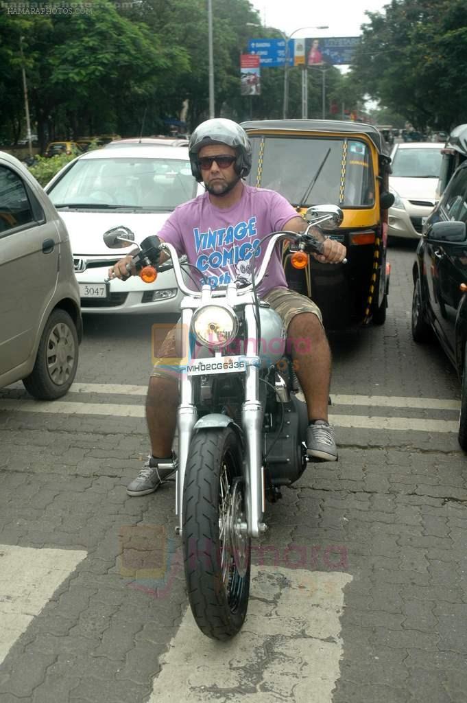 Vishal Dadlani snapped on his bike on a busy road in Mumbai on 22nd Aug 2011