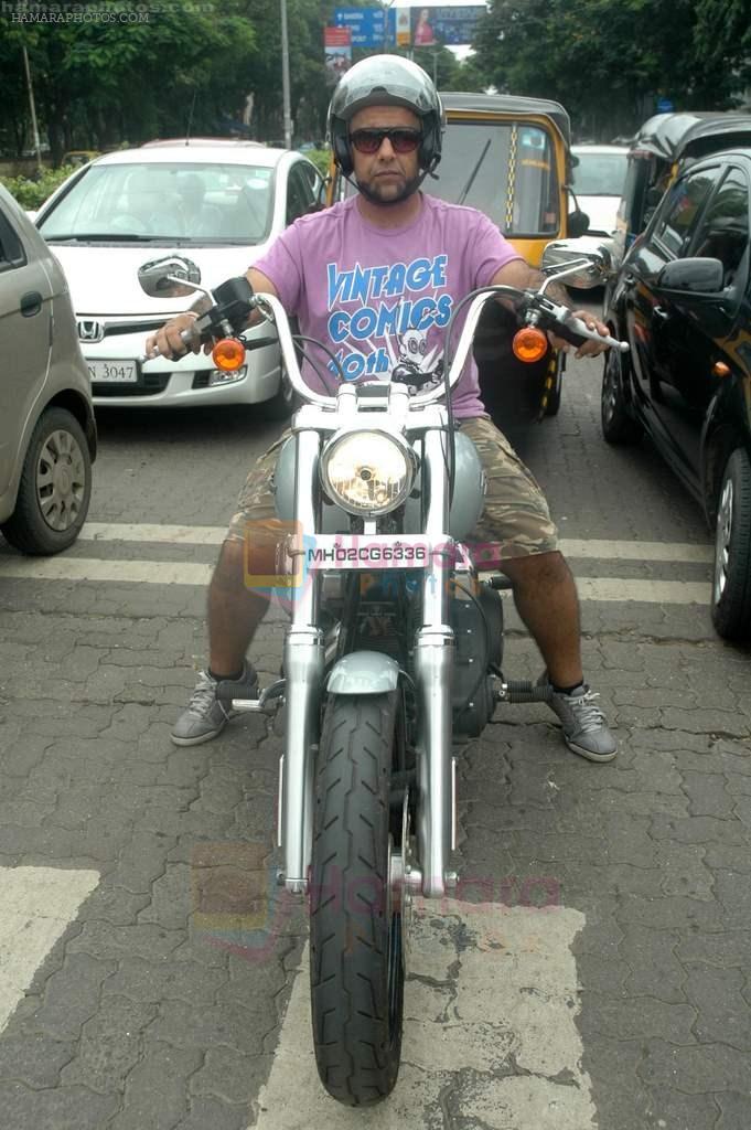 Vishal Dadlani snapped on his bike on a busy road in Mumbai on 22nd Aug 2011