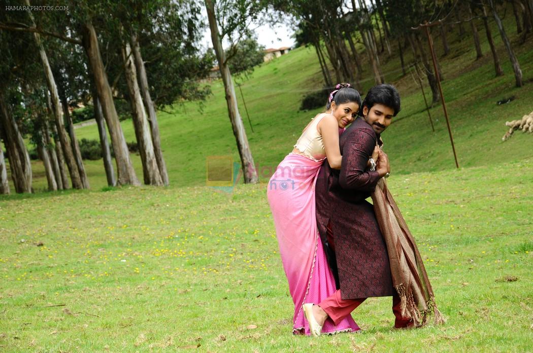 Shamna Kasim (Poorna), Sai Pradeep Pinisetty (Aadhi) in Chelagatam Movie Stills