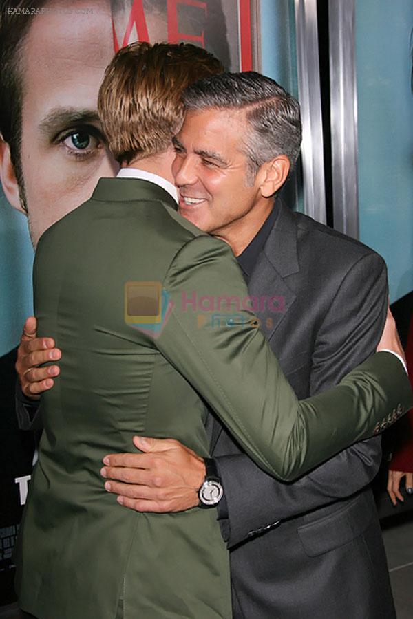 Ryan Gosling and George Clooney attends the The Ides of March Los Angeles Premiere in AMPAS Samuel Goldwyn Theater on 27th September 2011