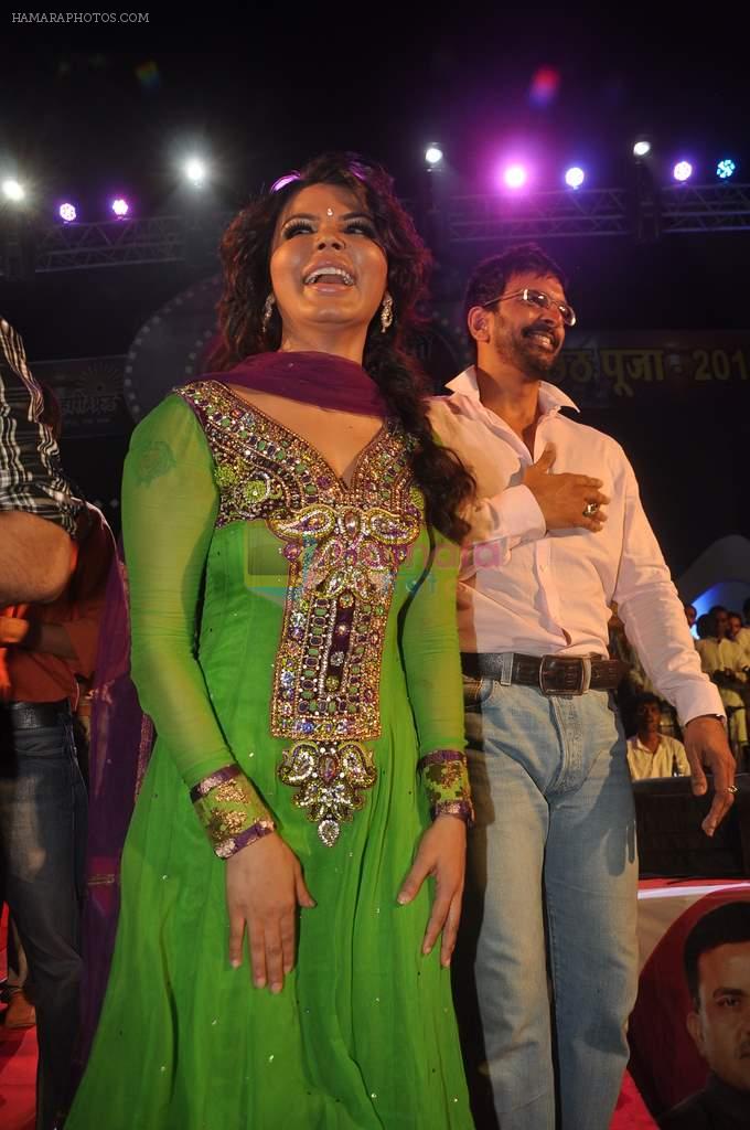 Rakhi Sawant with the star cast of the film The Loot at Sanjay Nirupam's Chatt Pooja in Juhu Beach on 1st Nov 2011