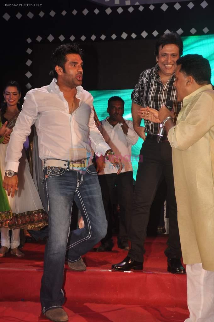 Govinda, Sunil Shetty with the star cast of the film The Loot at Sanjay Nirupam's Chatt Pooja in Juhu Beach on 1st Nov 2011