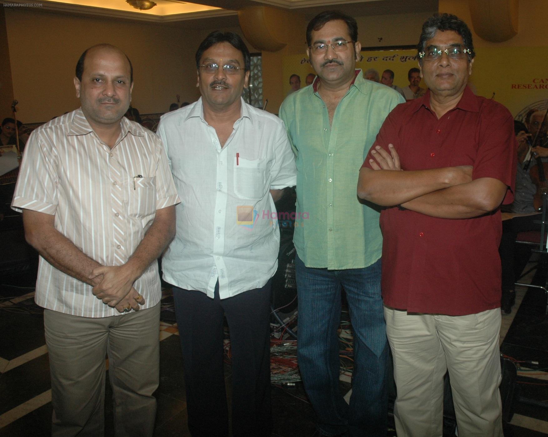 Anil Garg,Jayanti Ghosherand Sudesh Bhosle with Kishore Sharma at the rehearsals for the Cancer Aid & Research Foundation's Music Heals 2011 with 100 live musicians under the Music Batonship of Jayanti Gosher & Kisho