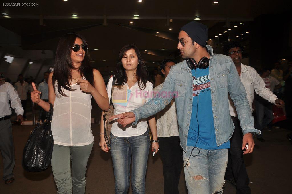 Priyanka Chopra, Ranbir Kapoor snapped returning from Barfee shoot in Mumbai airport on 24th Nov 2011