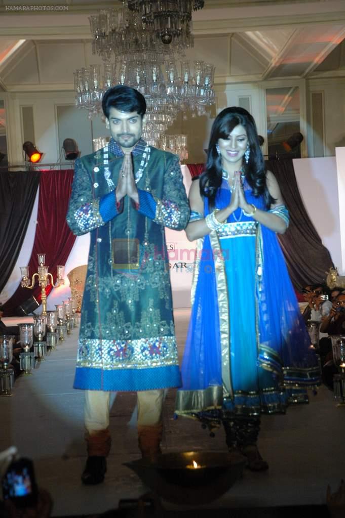 Debina and Gurmeet Chaudhary walk the ramp for Nisha Sagar's bridal show in Trident on 10th Dec 2011
