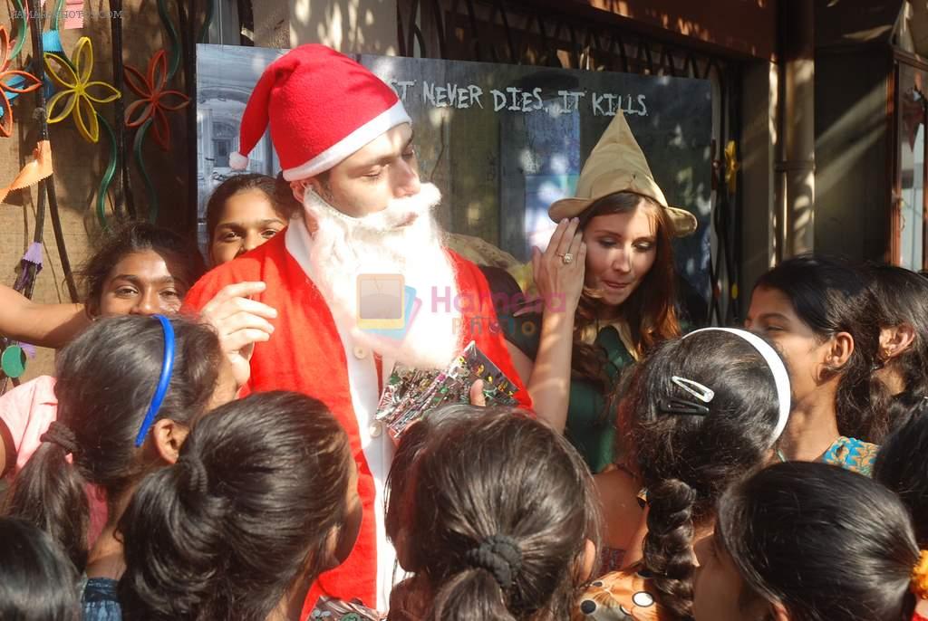 Shiney Ahuja turns santa in Andheri, Mumbai on 24th Dec 2011